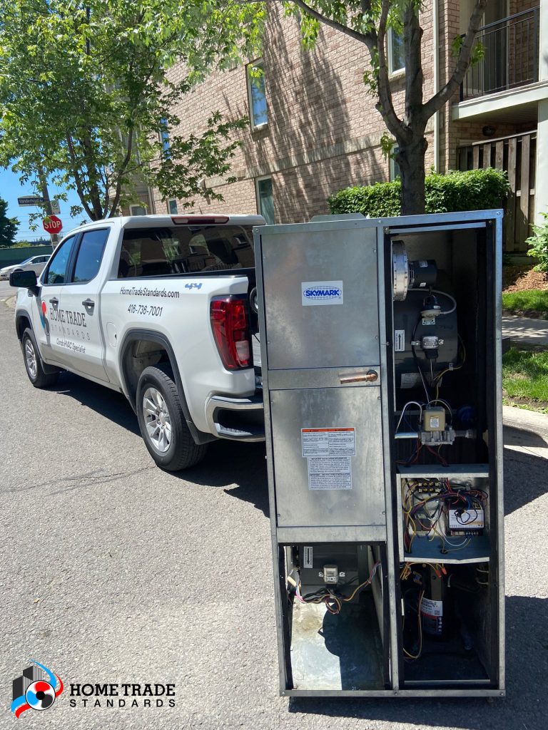 Skymark HVAC System next to a Home Trade Standards truck.